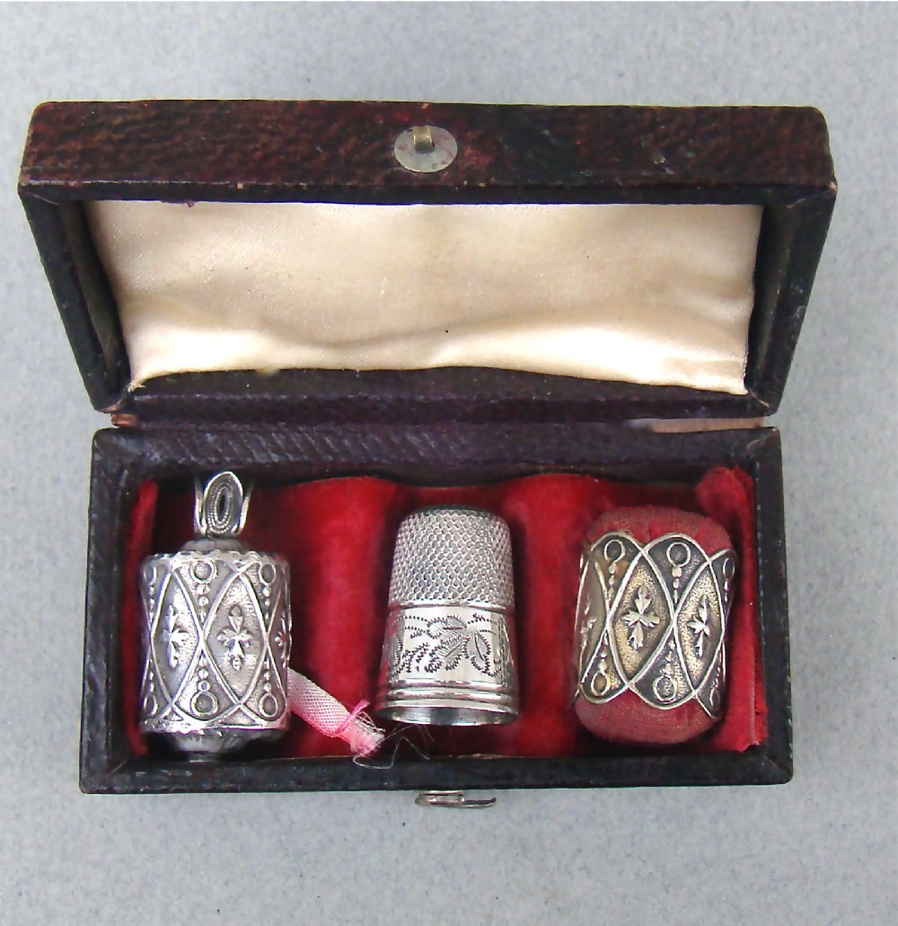 early victorian silver thimble tape measure pin cushion trio in presentation case circa 1840