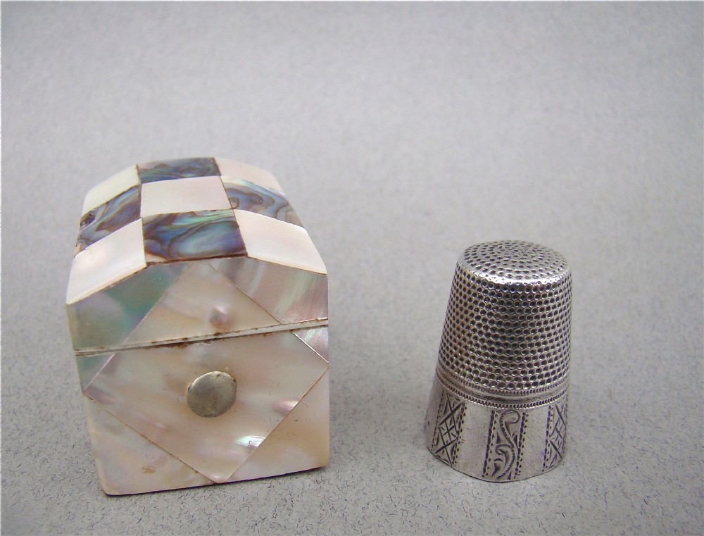 continental silver thimble fitted in mother of pearl abalone case circa 1860