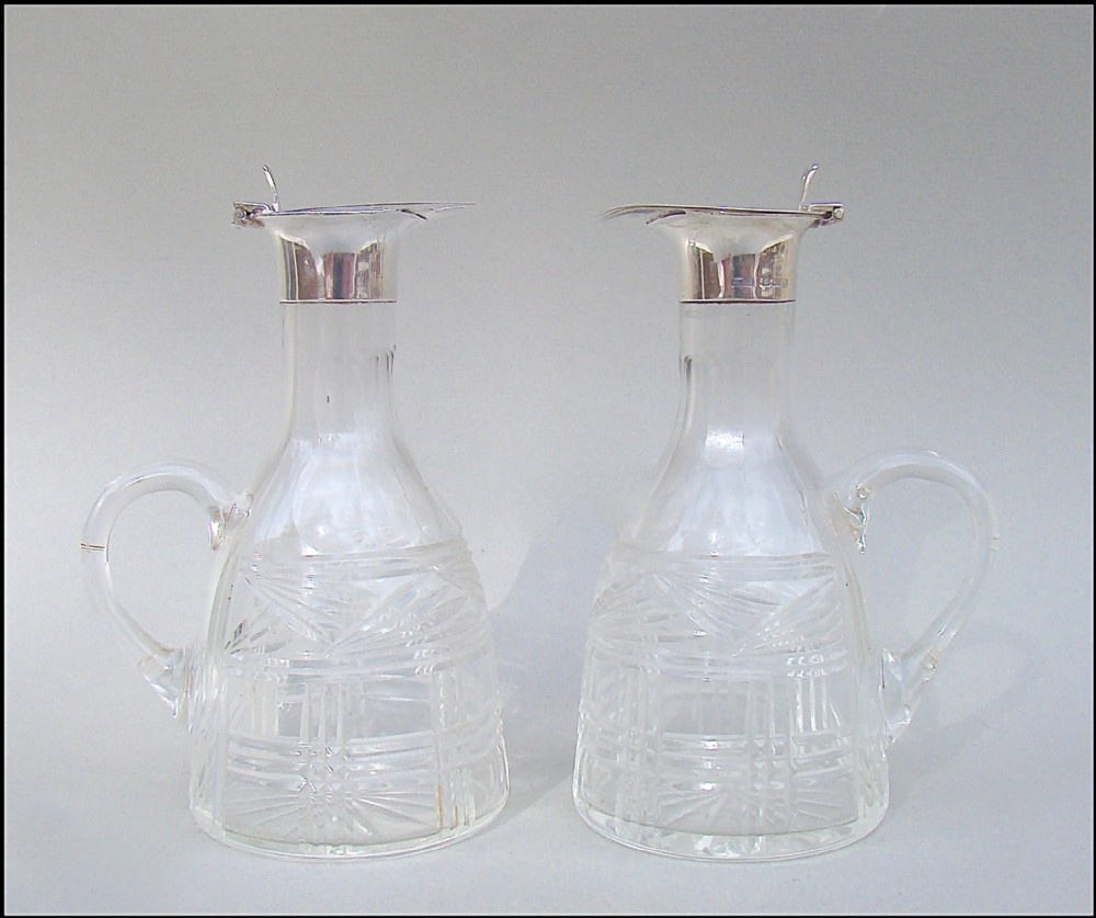 pair of silver mounted whisky tots by levi salaman birmingham 1926