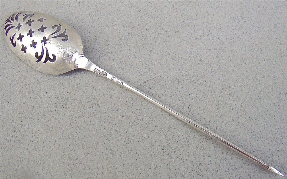 georgian lace back silver mote spoon by marmaduke daintrey london circa 1730
