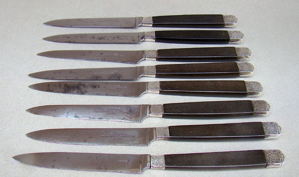 set of eight 19th c french dessert knives with wood handles silver ferrules and steel blades circa 1890
