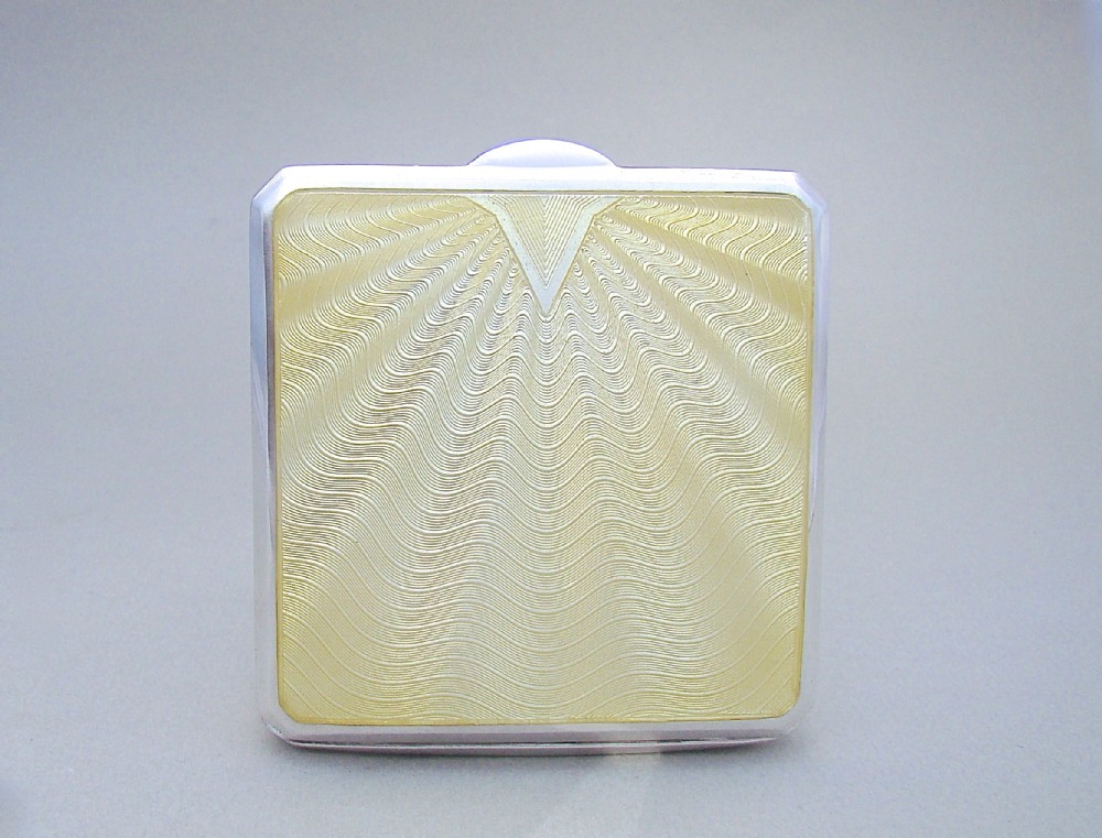 art deco silver and guilloche enamel compact by the goldsmiths silversmiths company london 1938