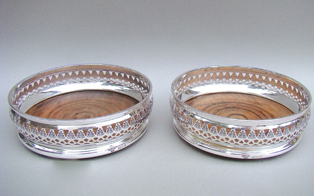 pair of mid 20th century solid silver wine coasters by a chick sons ltd london 1968