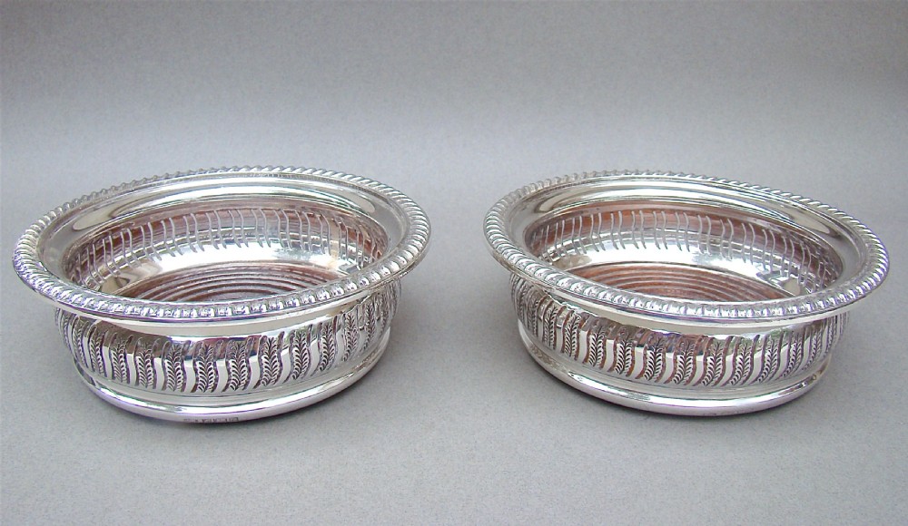superb pair of mid 20th century solid silver wine coasters by mappin webb birmingham 1968