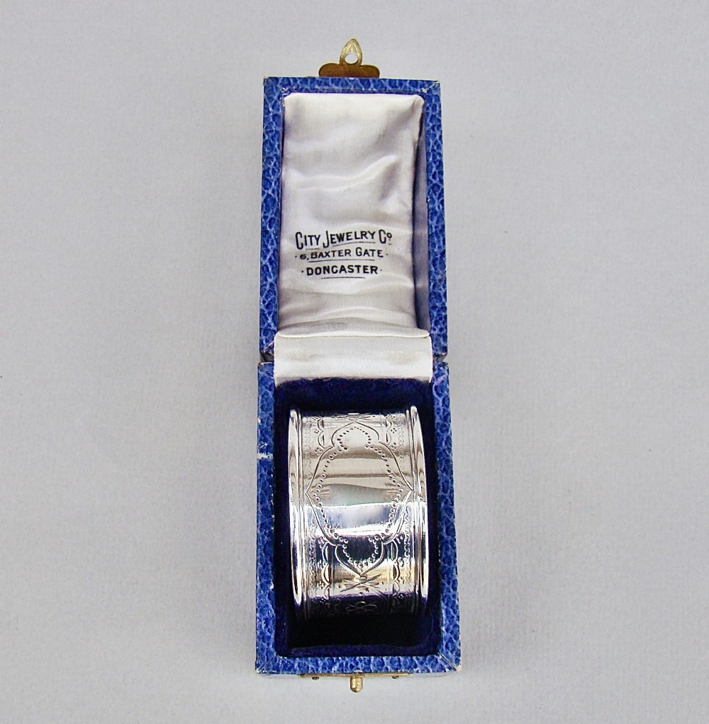 cased victorian silver napkin ring by edward hutton london 1882