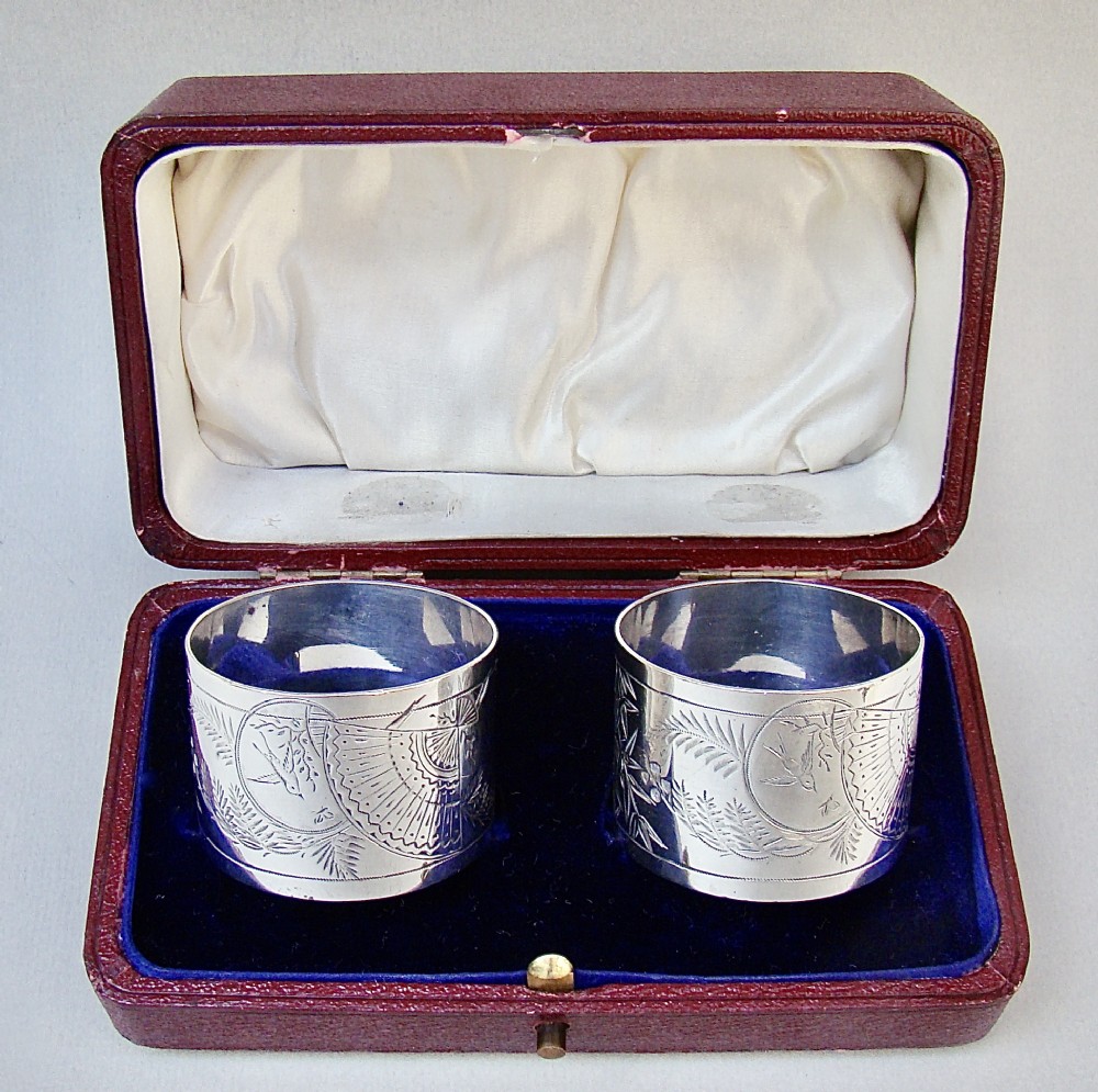 fabulous cased pair of victorian silver aesthetic movement napkin ring by george adams london 1881