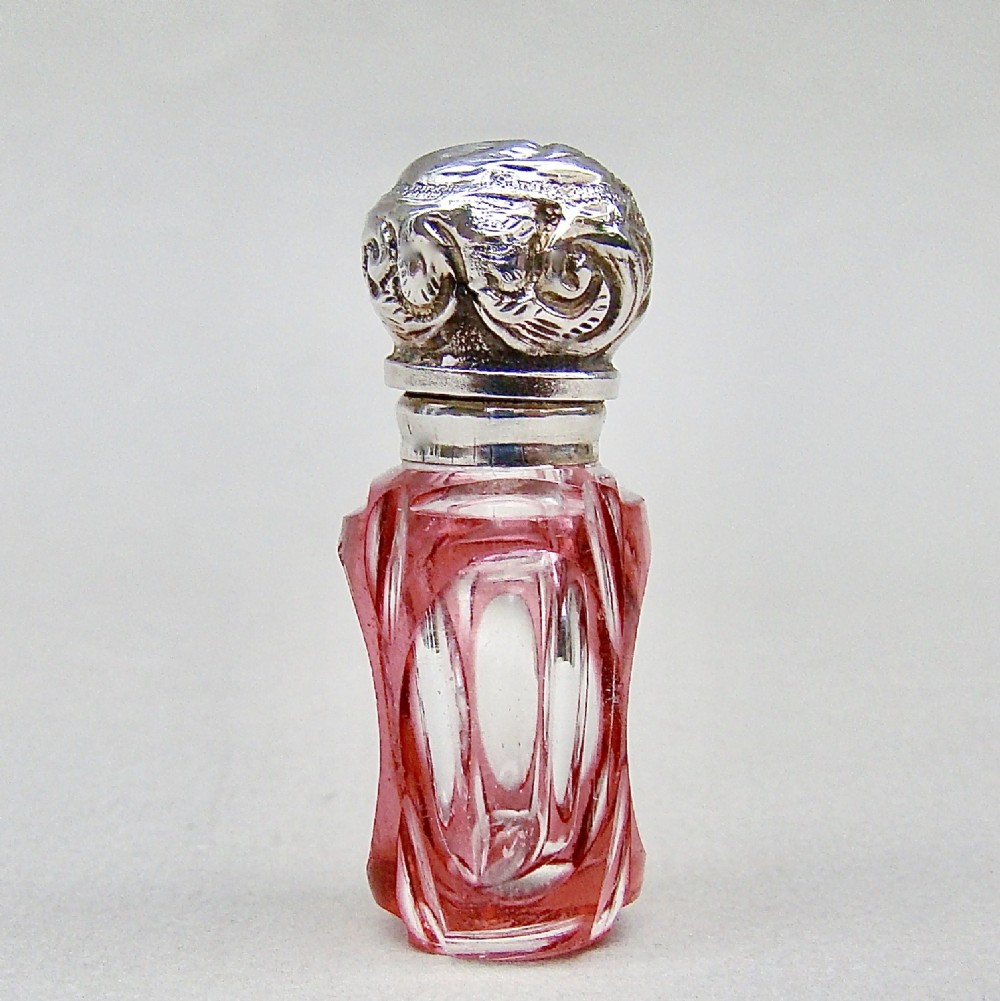 miniature victorian silver overlay cranberry glass scent bottle circa 1890