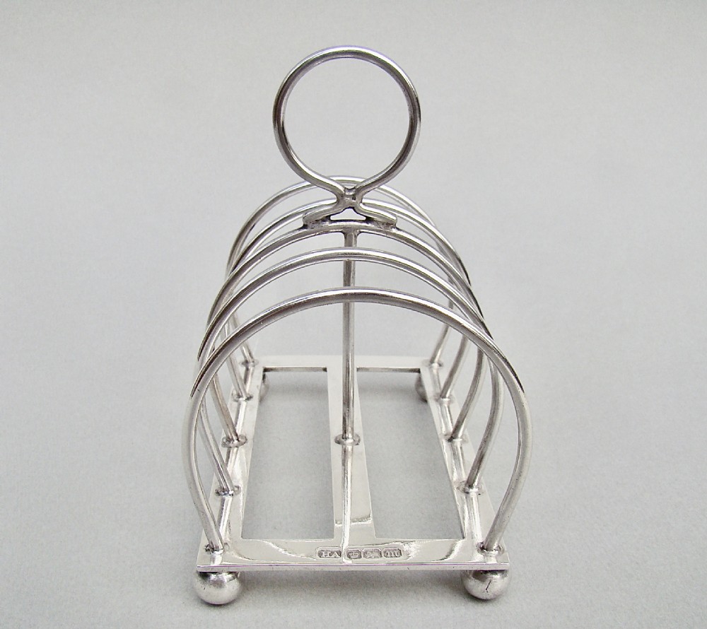 good edwardian silver toast rack by the atkins brothers sheffield 1904