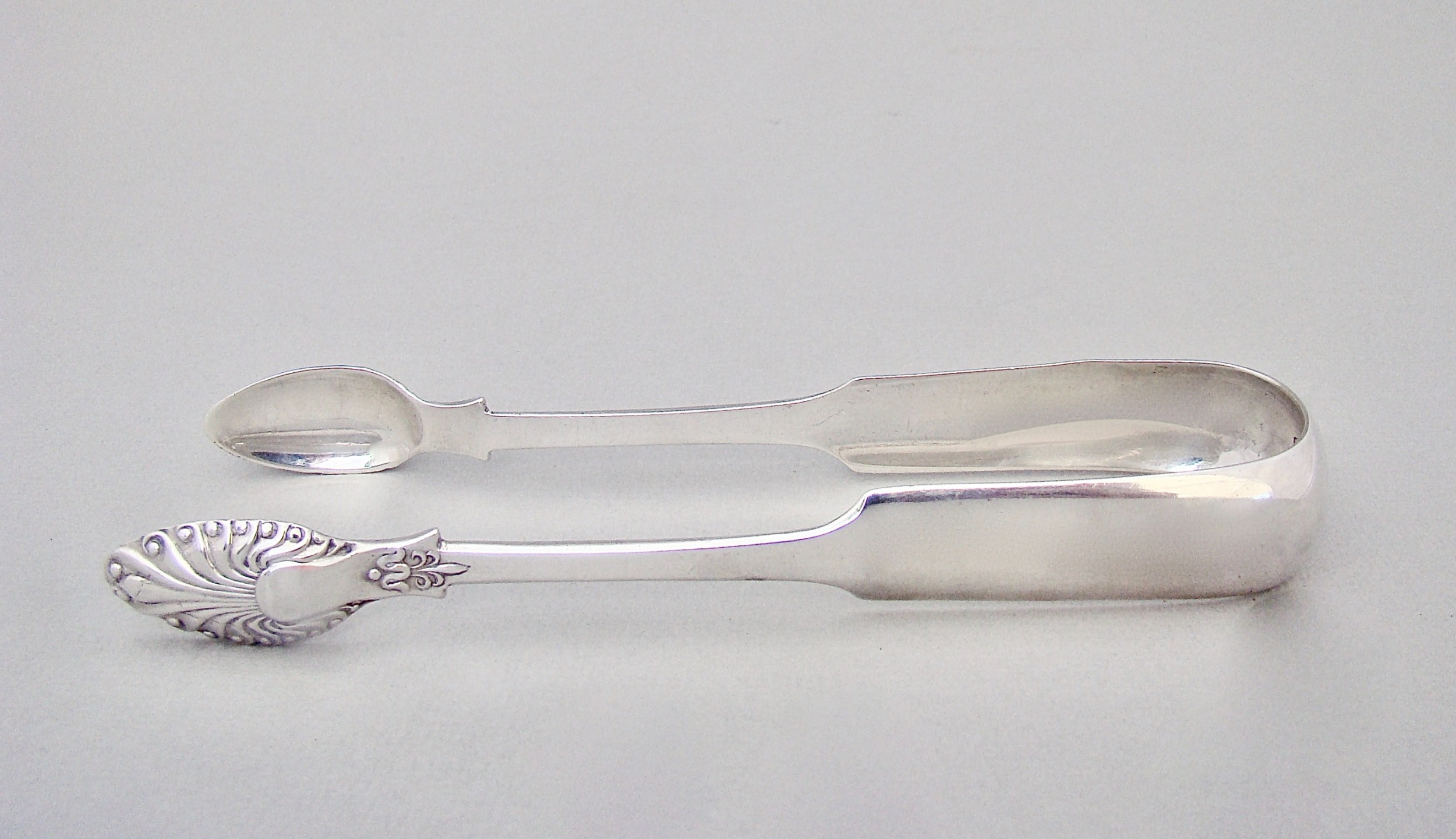 pair of early victorian scottish silver sugar tongs by james andrew kelly glasgow 1845