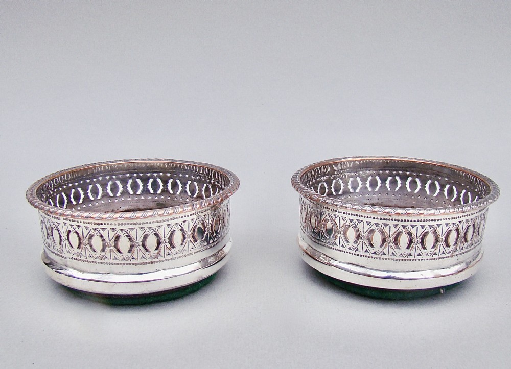 pair of edwardian silver plated condiment coasters circa 1910