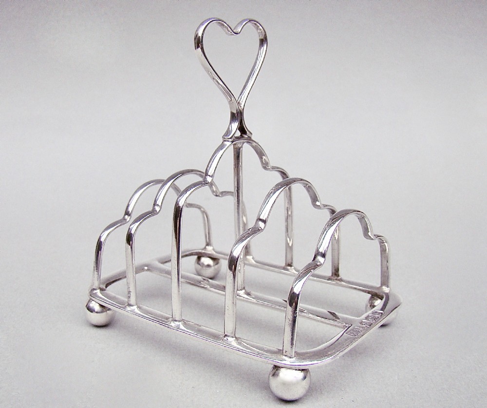 victorian novelty silver heartshaped handled toast rack by the atkins brothers sheffield 1895