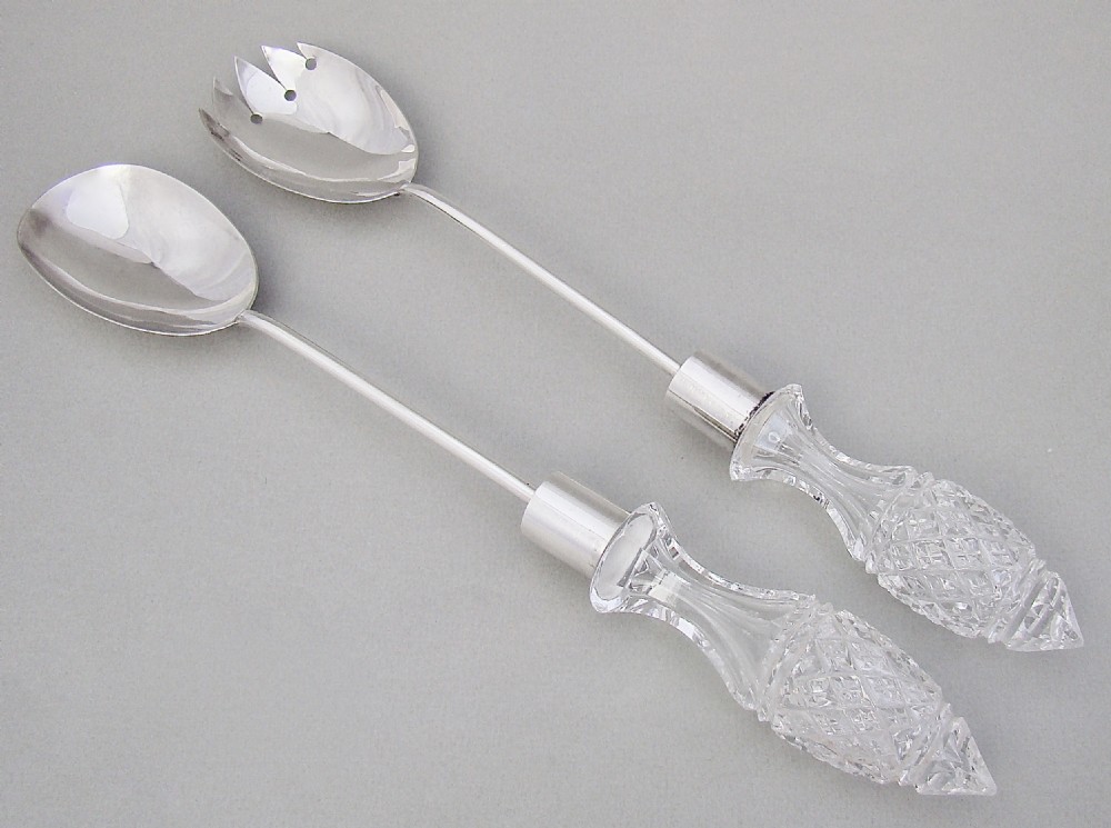 good pair of solid silver cut glass salad servers by the army navy london 1913