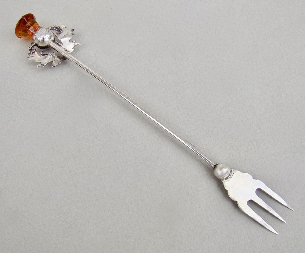art deco silver and amber thistle cocktail fork or pickle fork by adie lovekin birmingham 1927