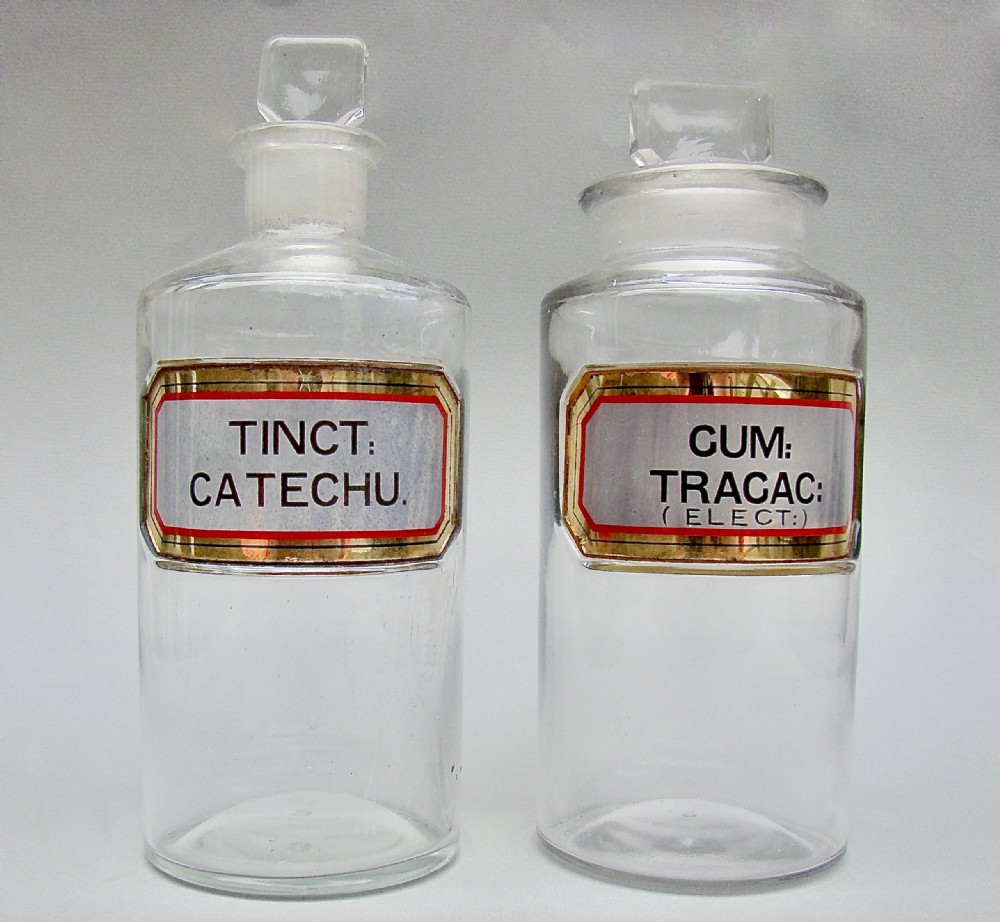 rare pair of mediumsized victorian grey label apothecary bottles circa 1890