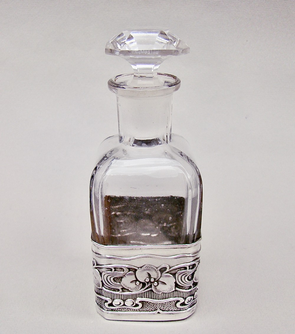 art nouveau silver and glass cologne bottle by the atkins brothers birmingham 1905