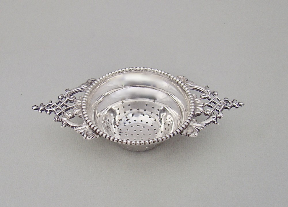delightful george v silver tea strainer by walker hall sheffield 1915
