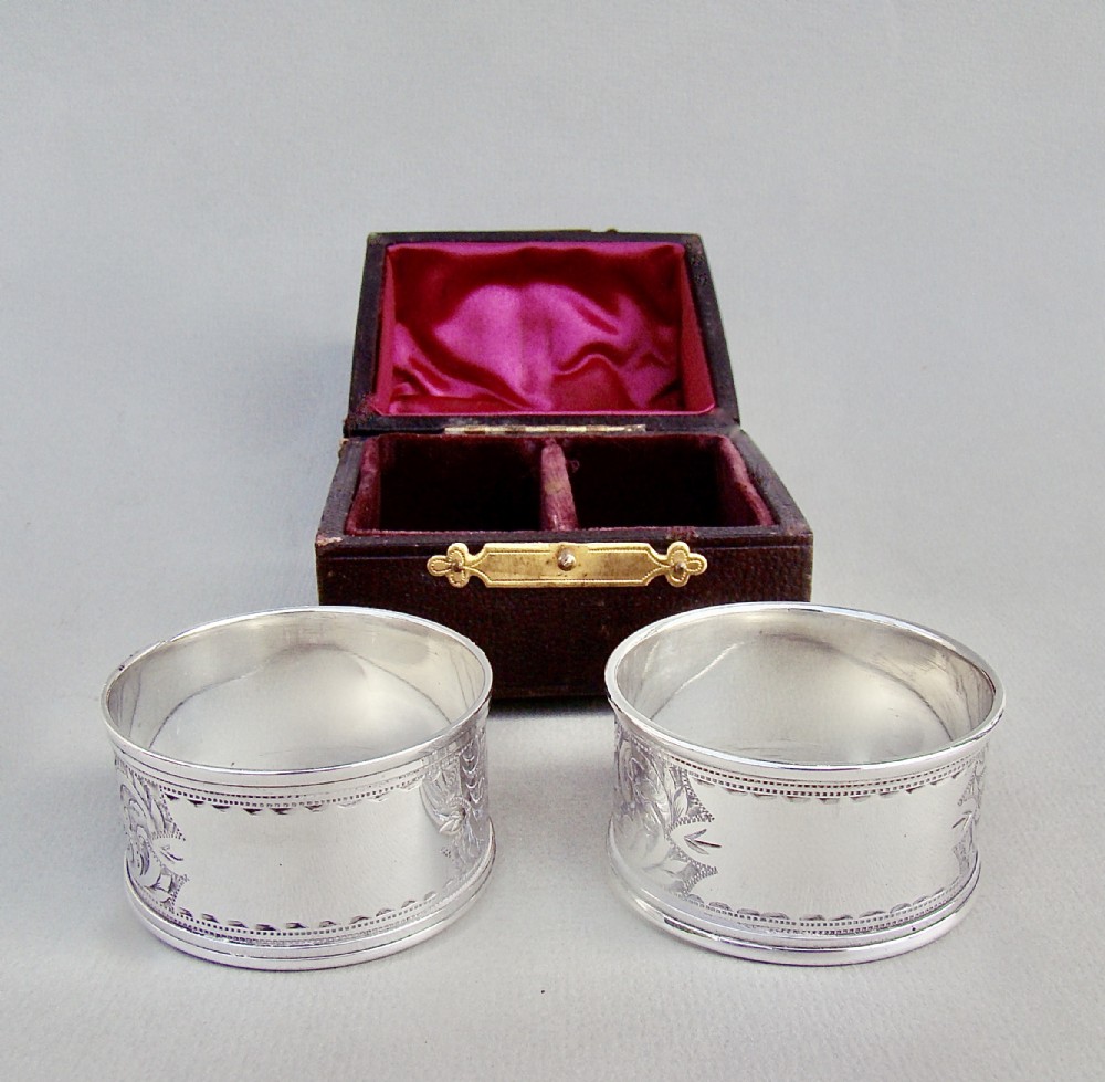 cased pair of edwardian engraved silver napkin rings by the rolason brothers chester 1903