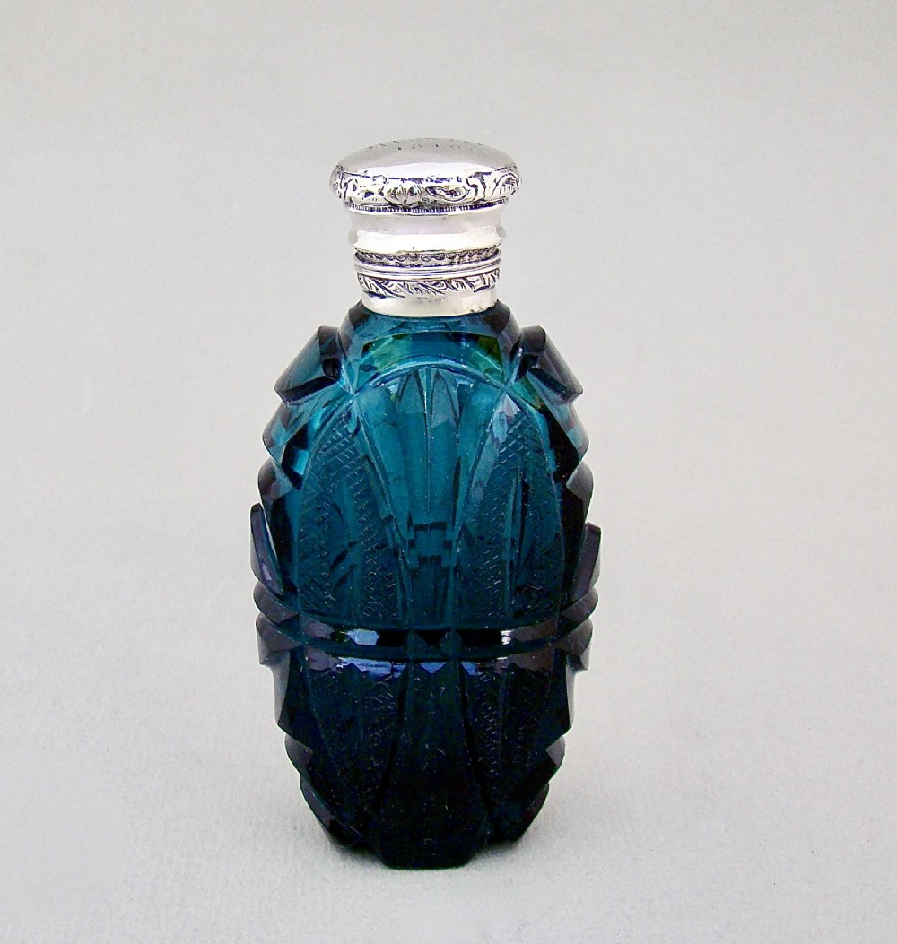 fabulous early victorian silver mounted slicedcut teal glass scent bottle dated 1848