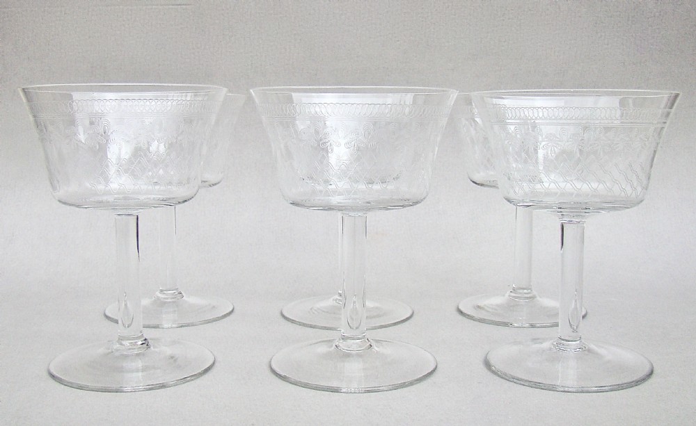 set of six art deco etched pall mall champagne glasses circa 1910