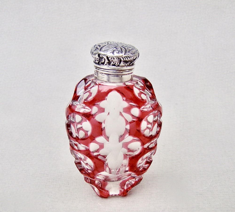 rare edwardian silver overlay cranberry glass scent bottle by charles may birmingham 1901