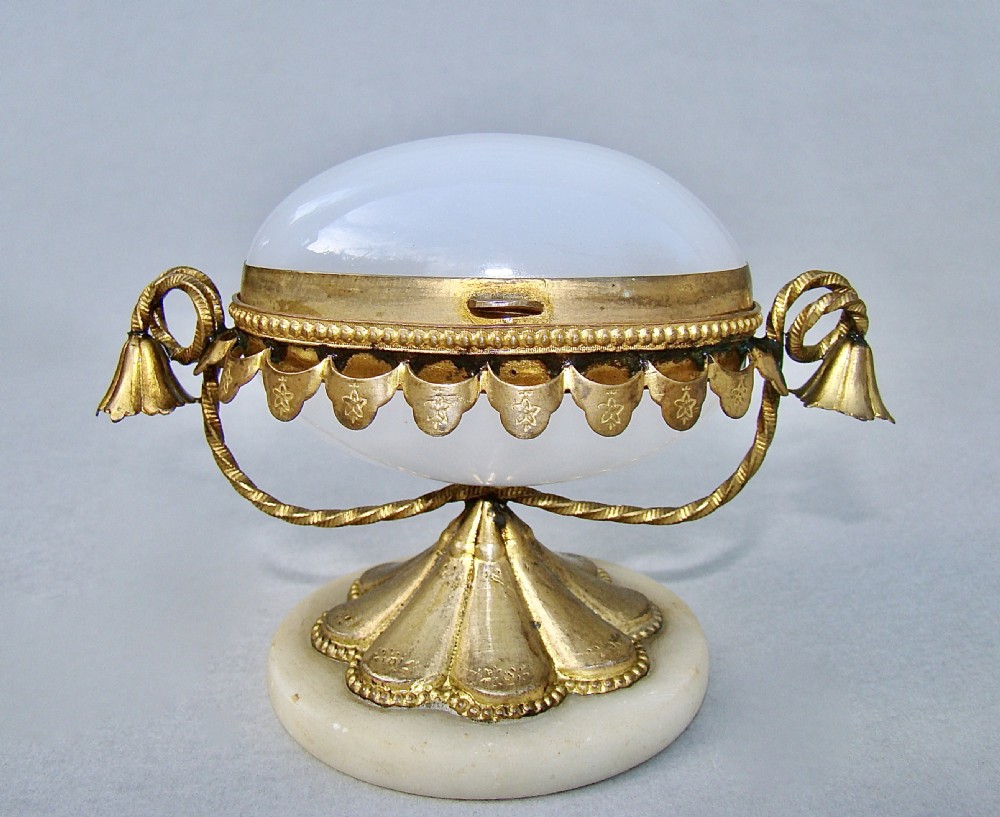 french palais royal eggshaped opaline glass casket with gilt ormulu mounts circa 1860