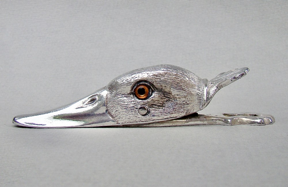 novelty silver plated duck head paper clip circa 1920