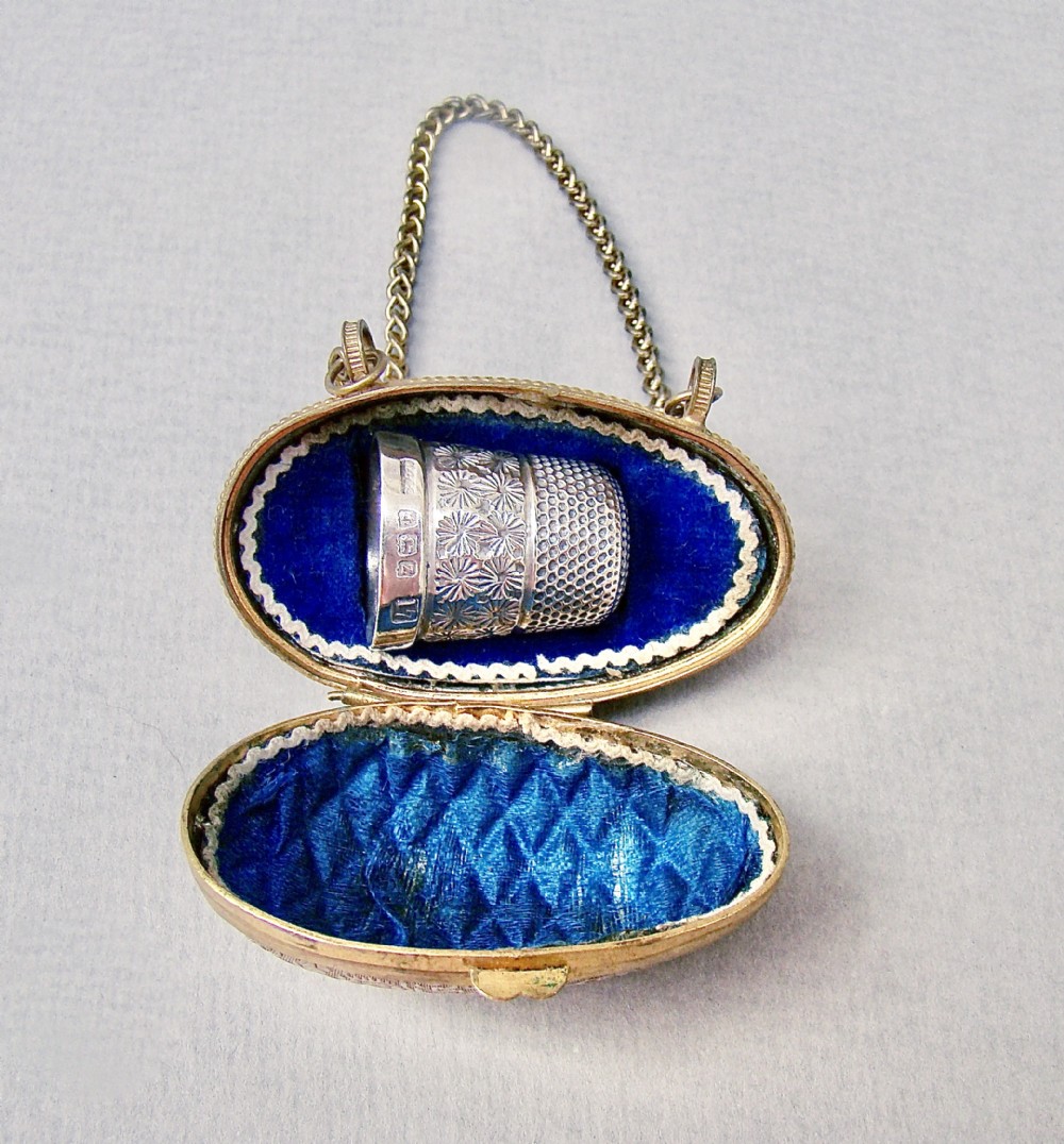 exquisite solid silver thimble in ormulu chatelaine eggshaped holder