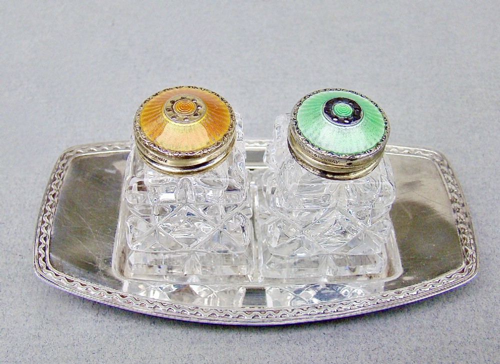 pair of norwegian art deco silver and enamel salts on silver stand circa 1930