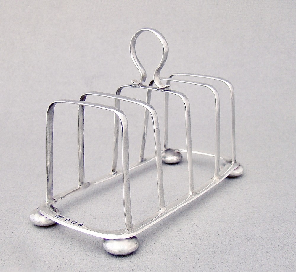 elegant edwardian silver toast rack by joseph gloster birmingham 1908