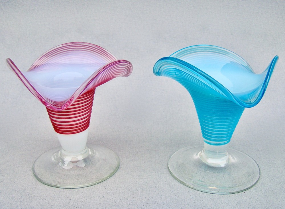 unusual pair of victorian opaline trailed glass candlesticks circa 1890